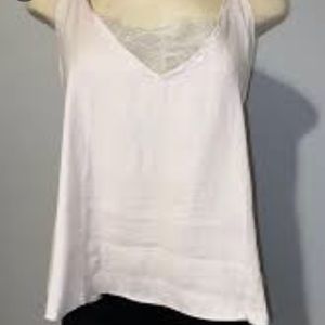 Free People light pink silk cami with nude lace detail.